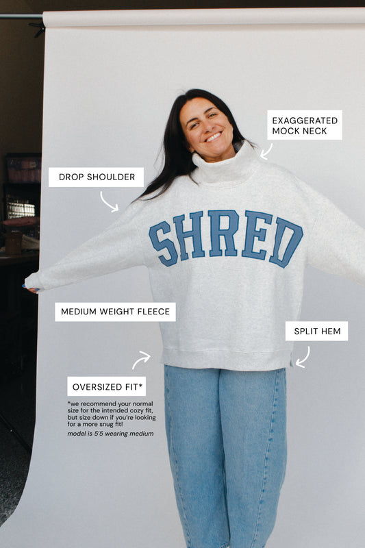 Shred Mock Neck Fleece Sweater